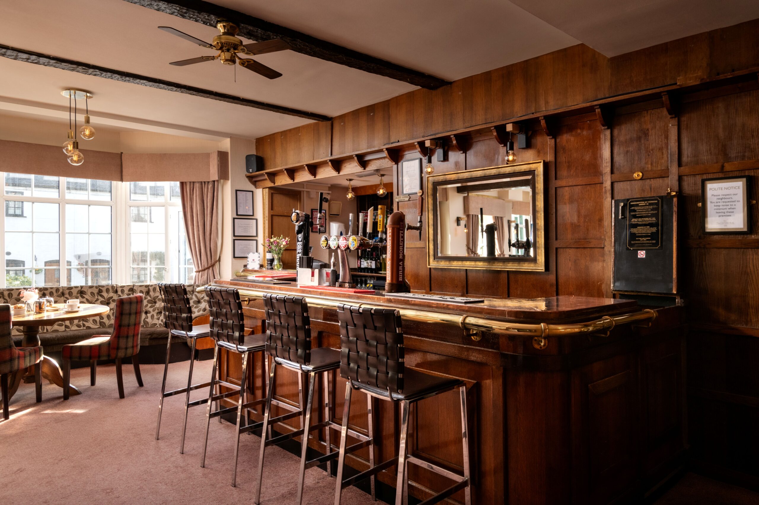 Bar counter and stools at The Cathedral Hotel